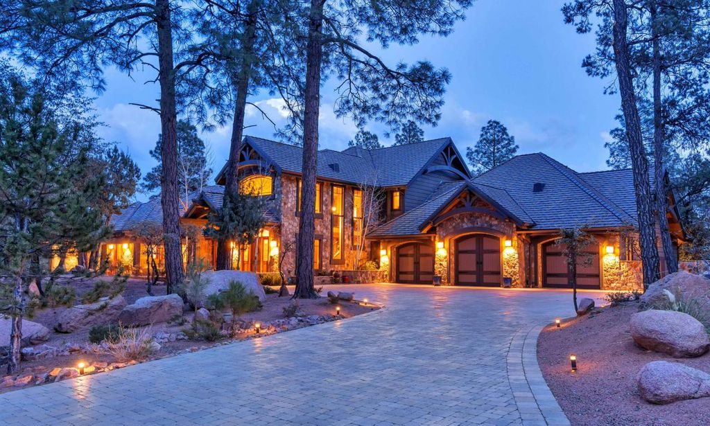 One of a kind masterpiece in design, finish and decor. Rustic elegance located in gated golf community. Complete with natural stone veneer and plenty of outdoor living space. Reclaimed floors and beams throughout. Separate upstairs living area and 2 full kitchens.