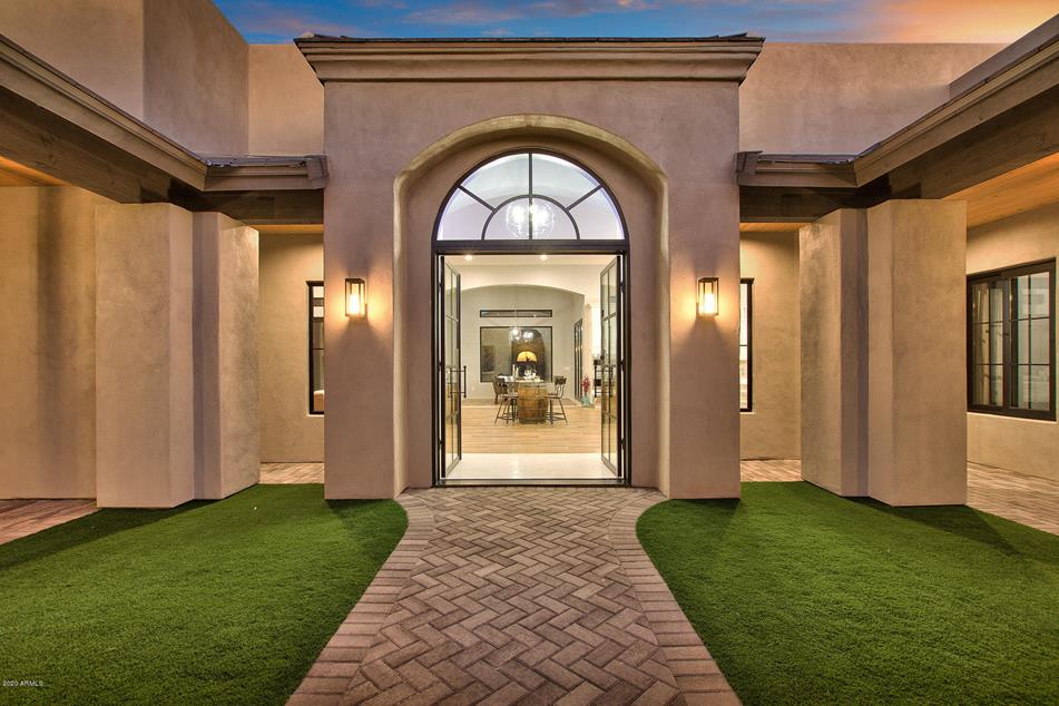 Enclosed Courtyard Custom Home with 6 Bedrooms, 6 Bathrooms and 5 Car